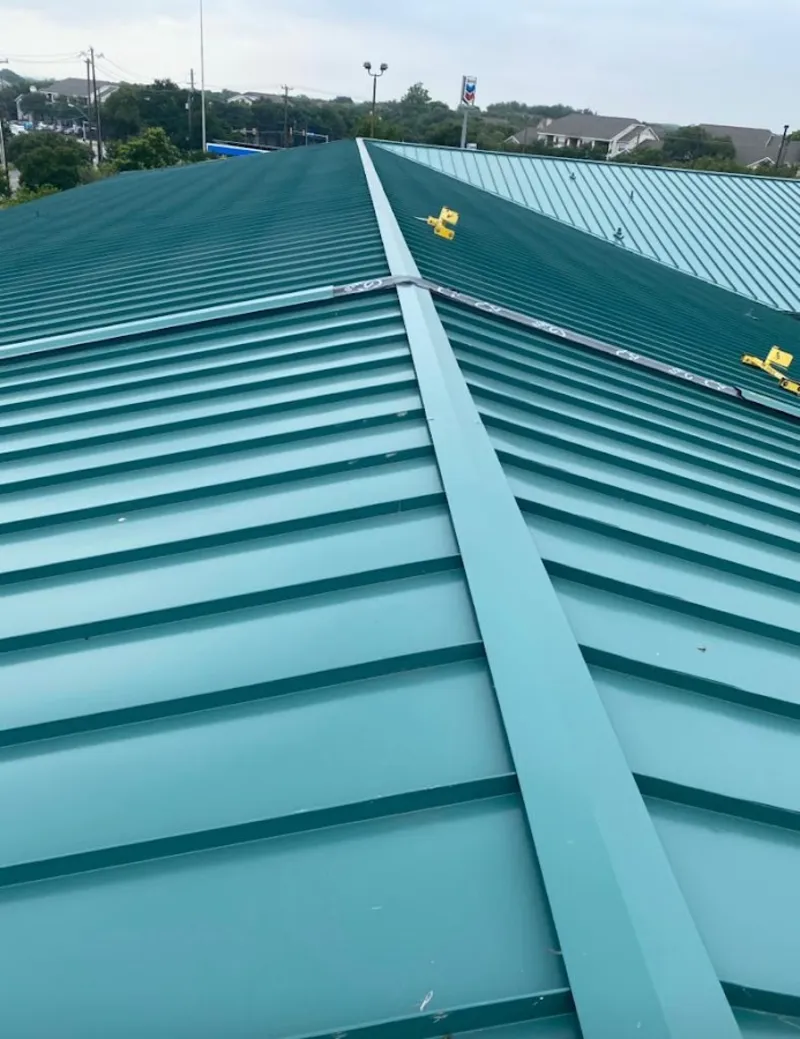 Green commercial metal roof ridge and valley for Metal Roof Repair in Palmview