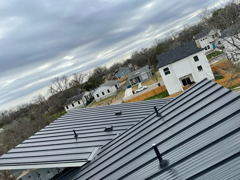 Standing seam metal roof panels with vents for Skylight Repair in Palmview